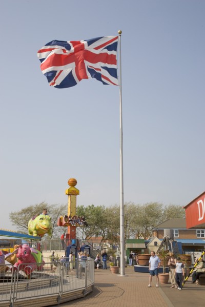 ENGLAND, West Sussex, Littlehampton, Harbour Park Amusements with families enjoying rides.  British