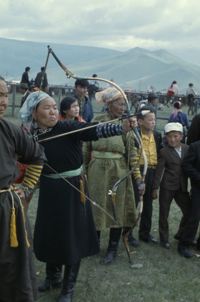 MONGOLIA, Ulan Bator, Nadam  National Day Ulan Bator Stadium Woman competitor taking part in
