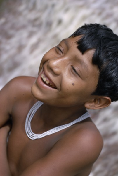 COLOMBIA, North West Amazon, Tukano Indigenous People, Head and shoulders portrait of laughing