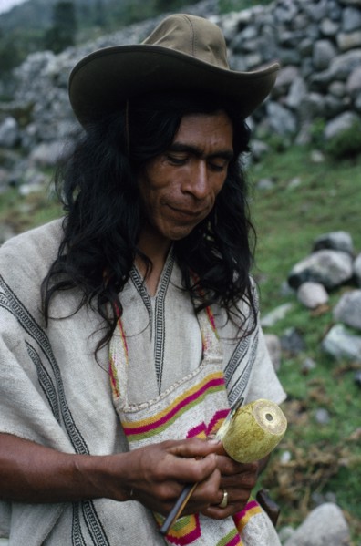 COLOMBIA, Sierra Nevada de Santa Marta, Ika, Ika man in traditional dress with hand woven mochila