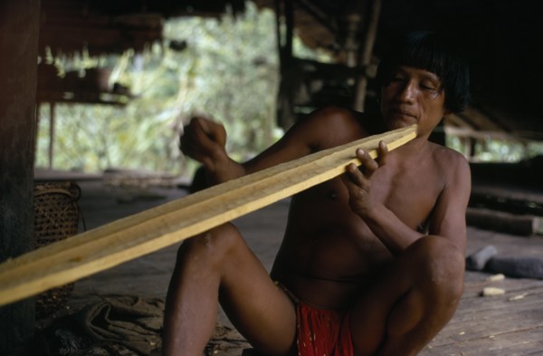 COLOMBIA, Choco, Embera Indigenous People, Embera family head  Heraklio  finely shaping wooden