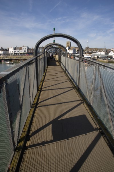 ENGLAND, West Sussex, Shoreham-by-Sea, Footbridge across the river Adur linking the town centre