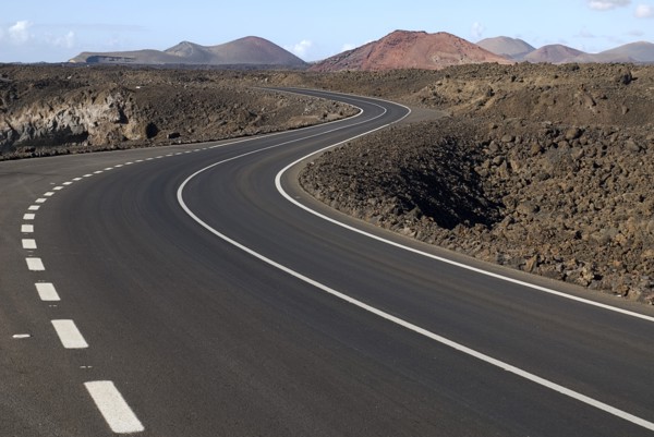 SPAIN, Canary  Islands, Lanzarote, Distant view of Timanfaya National Park and the Montanas del