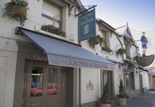 ENGLAND, West Sussex, Shoreham-by-Sea, Exterior of the Crown and Anchor public house in the high