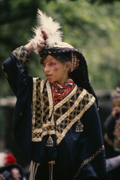 PAKISTAN, North West Frontier, Bumburet, Young Kalash girl wearing traditional dress at the