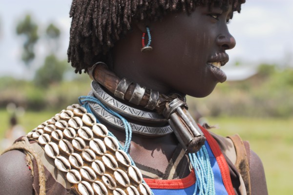 ETHIOPIA, Lower Omo Valley, Key Afir, Banner woman wearing a necklace know as a Bignere - an metal