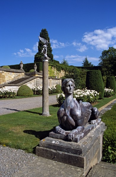 ENGLAND, Oxfordshire, Woodstock, Blenheim Palace. Sphinx statue in lower water terrace.