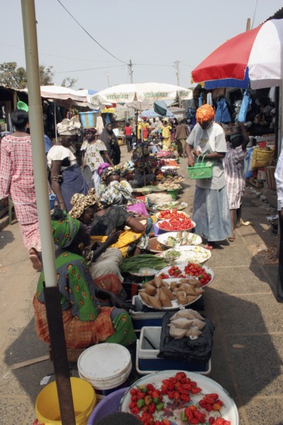 GAMBIA, Western Gambia, Serekunda, "Bakau Market, Atlantic Road.  Busy market scene with women