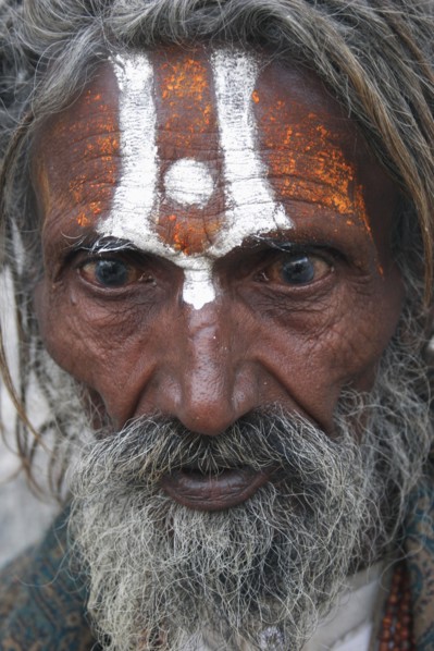 INDIA, Rajasthan, Udaipur, "Portrait of elderly male Hindu beggar outside the Jagdish Temple.  With