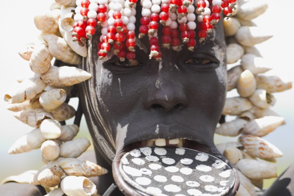 ETHIOPIA, South Omo Valley, Mursi Tribe, Woman with lip plate.