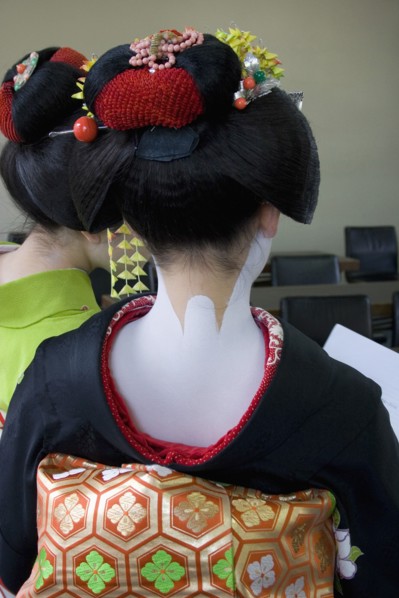 JAPAN, Honshu, Kyoto, Gion District.  Back of Geisha attending a class at Mia Garatso school for