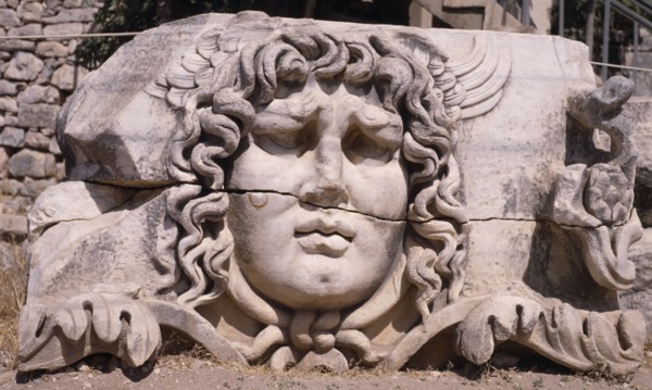 TURKEY, Altinkum, Didyma, Temple of Apollo.  Carved head of Medusa.