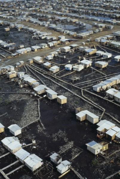 ECUADOR, Guayas Province, Guayaquil , Aerial view over slum housing with stilt buildings built over