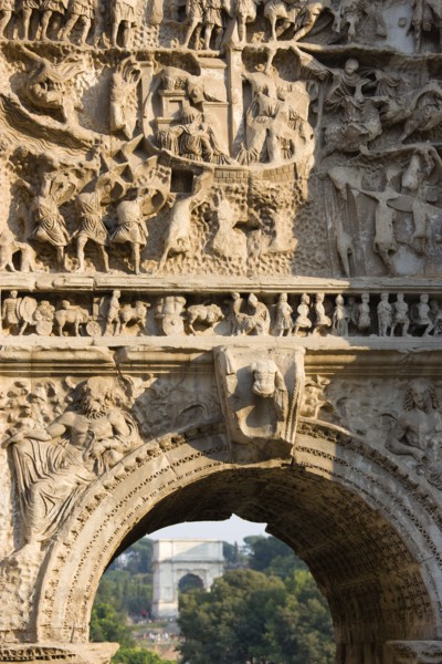ITALY, Lazio, Rome, The Forum with the Arch of Titus seen through the Arch of Septimius Severus
