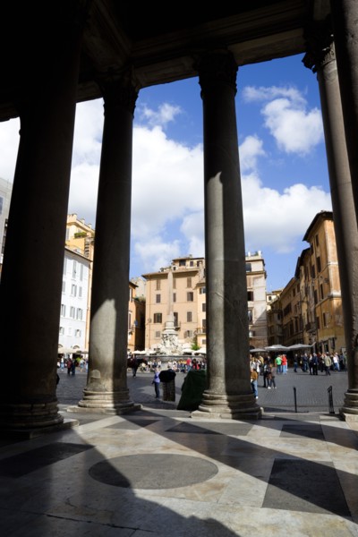ITALY, Lazio, Rome, Piazza della Rotonda seen through the granite columns of the Pantheon with