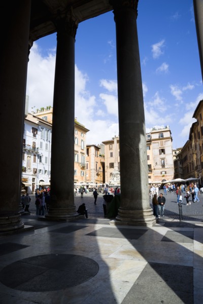 ITALY, Lazio, Rome, Piazza della Rotonda seen through the granite columns of the Pantheon with