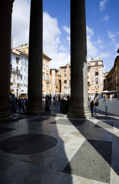 ITALY, Lazio, Rome, Piazza della Rotonda seen through the granite columns of the Pantheon with