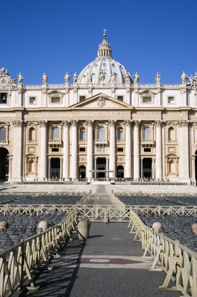 ITALY, Lazio, Rome, Vatican City The Basilica of St Peter with tourists at the entrance and empty