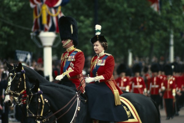 ENGLAND, London, The Queen and The Duke of Edinburgh on horseback returning from Trooping the