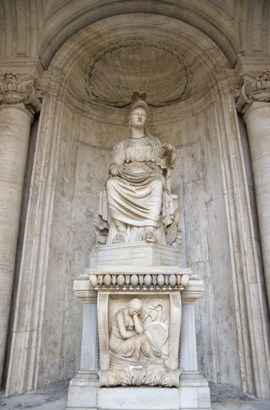 ITALY, Lazio, Rome, Colossal Statue of Sitting Rome Cesi Roma in a niche within the courtyard of