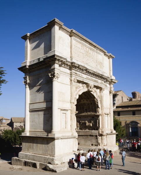 ITALY, Lazio, Rome, Tourists around the 19th Century reconstruction of the triumphal Arch of Titus