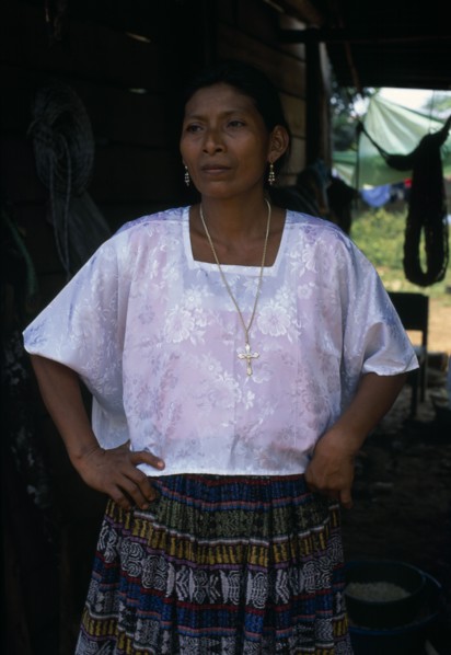 GUATEMALA, Alta Verapaz, Sacaak , Portrait of a Q’eqchi Indian mother wearing a white blouse and a
