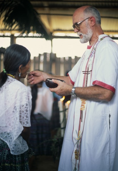 GUATEMALA, Alta Verapaz, Religion, Padre Tiziano an Italian Roman Catholic missionary giving