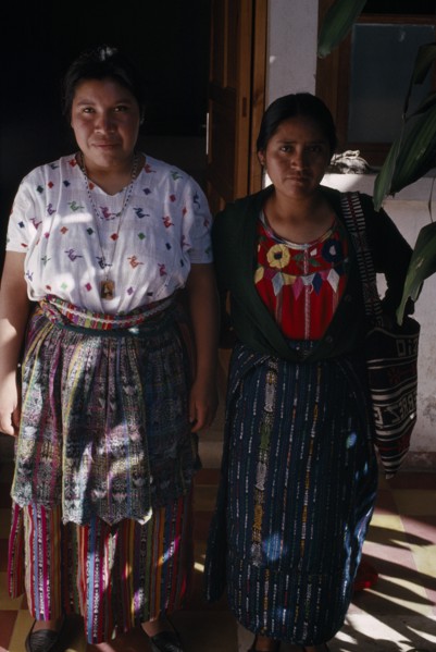 GUATEMALA, Alta Verapaz, Coban, Roman Catholic Mission. Full length standing portrait of two Quiche