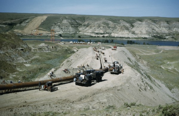 CANADA, Saskatchewan, Prairies, Constructing Trans Canada gas pipeline over Saskatchewan Prairies.