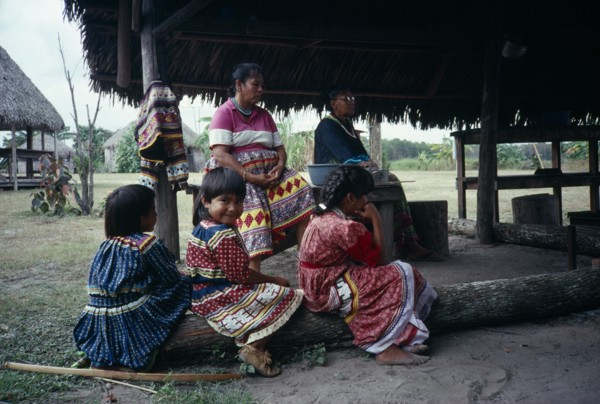 USA, Florida, Everglades, Independent Seminole Native American village. Family of women and young