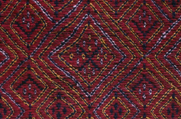 BANGLADESH, Crafts, Textiles, Detail of red and blue embroidered murang pinon or loin cloth.