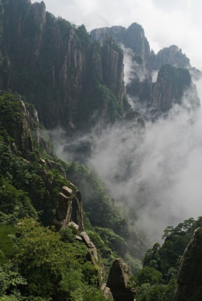 CHINA, Anhui Province, Huang Shan , Huangshan or the Yellow Mountain. Rock peaks with lush green