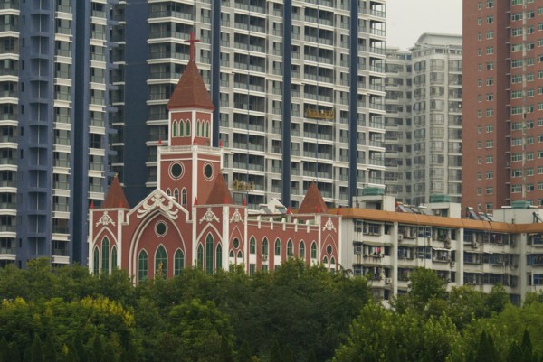 CHINA, Hubei , Wuhan, The Catholic Cathedral among modern apartment blocks