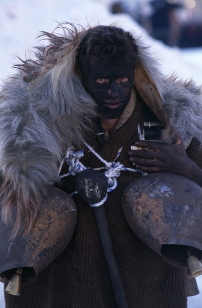 GREECE, North, Volakas, Reveller dressed as an Arapis during New Year carnival in village near
