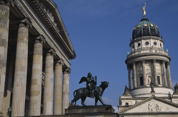 GERMANY, Berlin, Gendarmenmarkt.  Statue of winged Bacchus riding a panther in front of the