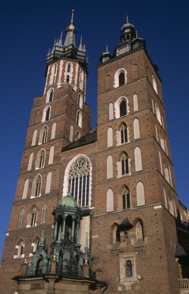POLAND, Krakow, Mariacki Basilica or Church of St Mary.  Gothic  red brick exterior built in the