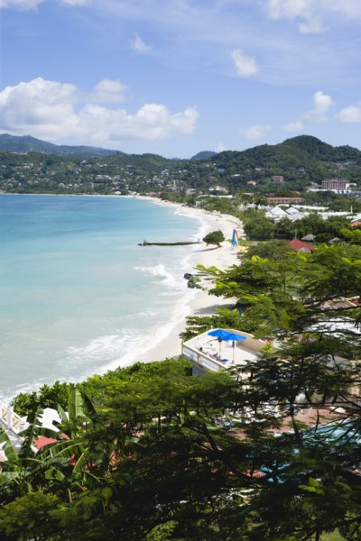 WEST INDIES, Grenada, St George, Waves of the aquamarine sea breaking on the two mile stretch of