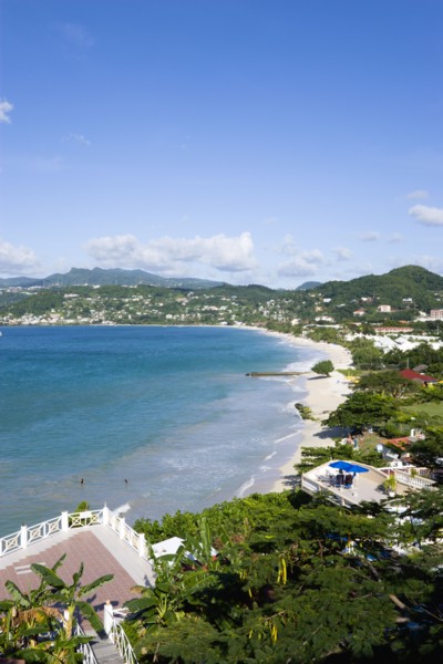 WEST INDIES, Grenada, St George, Waves of the aquamarine sea breaking on the two mile stretch of