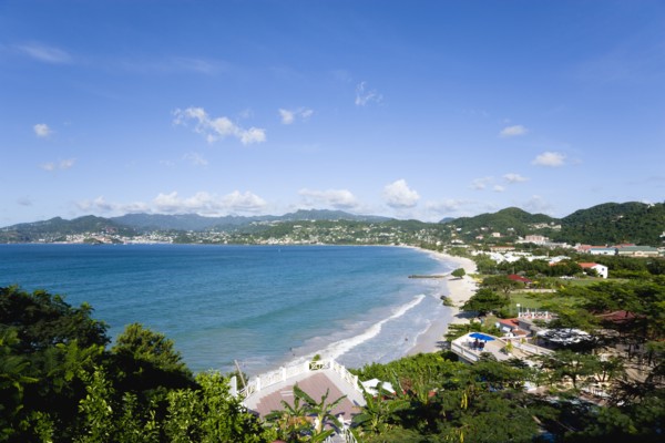 WEST INDIES, Grenada, St George, Waves of the aquamarine sea breaking on the two mile stretch of