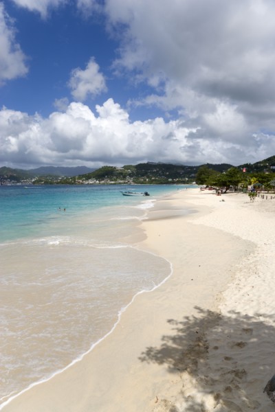 WEST INDIES, Grenada, St George, Waves of the aquamarine sea breaking on the two mile stretch of