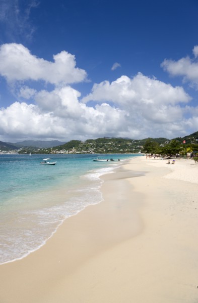 WEST INDIES, Grenada, St George, Waves of the aquamarine sea breaking on the two mile stretch of