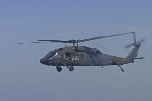 THAILAND, Phuket, "Tsunami. A helicopter in flight with rescue workers are flown from Phuket to