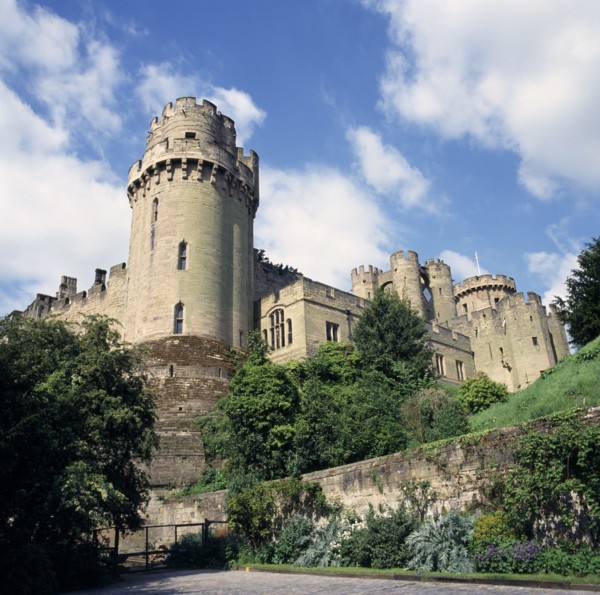 ENGLAND, Warwickshire, Warwick, Warwick Castle from Mill Street.  Original castle built by William