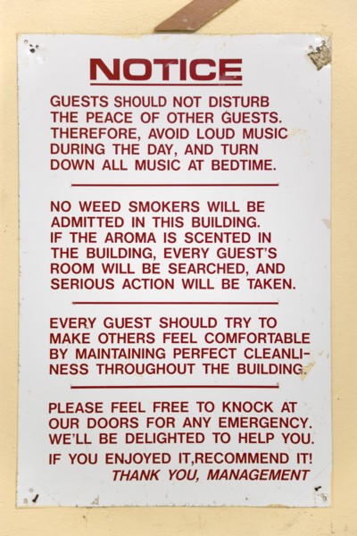 WEST INDIES, Grenada, Carriacou, Hillsborough Notice from the management on the wall of a hotel