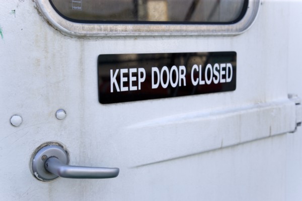 WEST INDIES, St Vincent & The Grenadines, Kingstown, Sign on a door of an inter island ferry ship