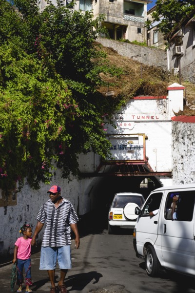 WEST INDIES, Grenada, St Georges, The Sendall Tunnel built in 1894 with pedestrians and cars moving