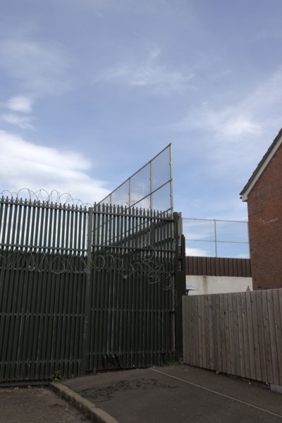 IRELAND, North, Belfast, "West, Falls Road, Peace Line barrier between the Catholic Lower Falls and