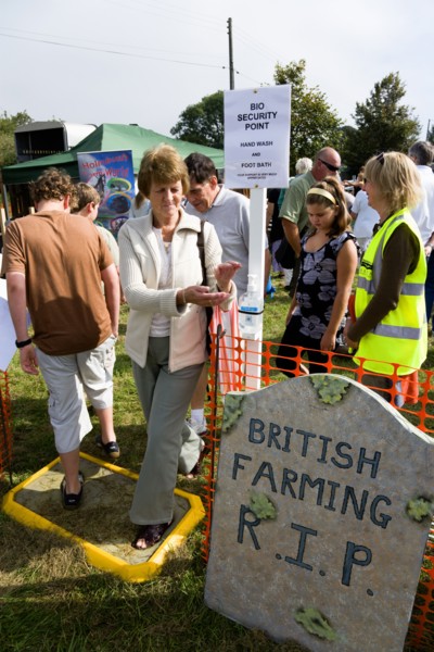 ENGLAND, West Sussex, Findon, Findon village Sheep Fair People passing through a Bio Security point