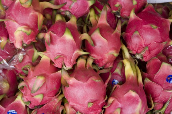 THAILAND, North, Chiang Mai, Close up of Dragon fruit on sale in market.
