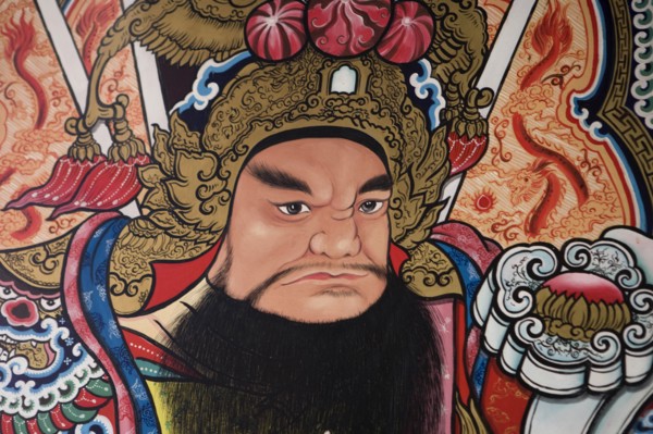 THAILAND, North, Chiang Mai, Pung Tao Gong Ancestral Temple. Close up of a colourful mural